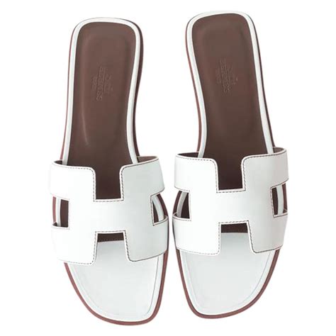 hermes white flat sandals|Hermes snakeskin sandals.